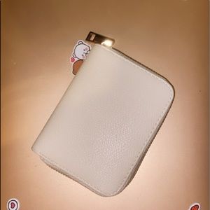 white-ish tan wallet